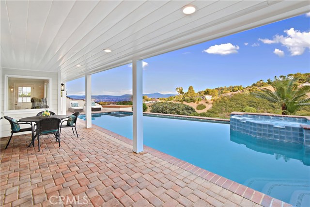 View from family room downstairs - french doors to pool