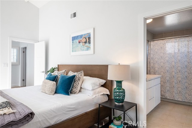ENSUITE MASTER BEDROOM INCLUDES DUAL SINKS, BATH TUB AND SHOWER COMBO AND LAUNDRY AREA.