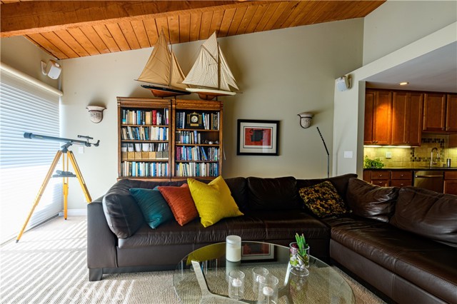 Living Room with view of kitchen--and power shades