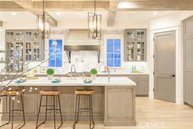 kitchen with walk-in pantry, 4 ovens, 2 dishwashers, Subzero wine cooler, 54 inch Subzero refrigerator