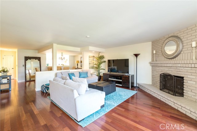 open living floor plan with fireplace