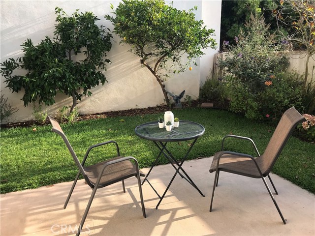 There is an easy indoor to outdoor transition through the double sliding glass doors from both the dining room and family room--great for entertaining! Enjoy the outdoors nice grass area and a patio that you, children and pets can all enjoy. Imagine possibly adding a waterfall feature that you can add to the ambience of your private backyard.