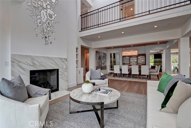 Cathedral Ceiling Formal Living Room is open to Dining Room