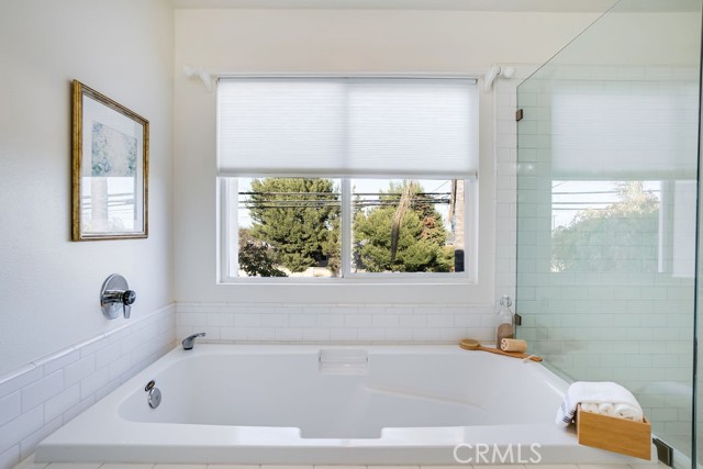 Large soaking tub to relax in!
