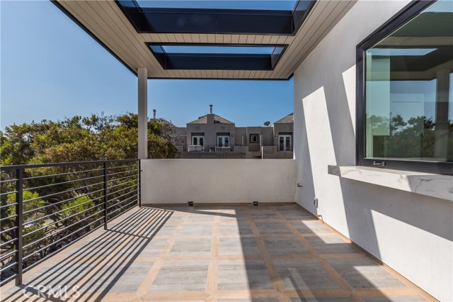 Over sized balcony with opening awning to the kitchen and lovely valley views