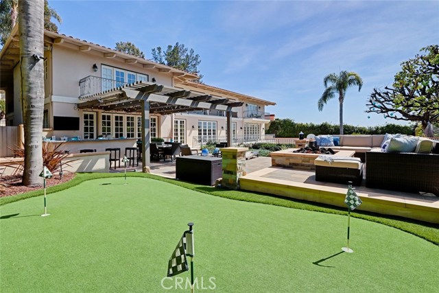 The 4-hole putting green on artificial turf will prep you for your next friendly competition.