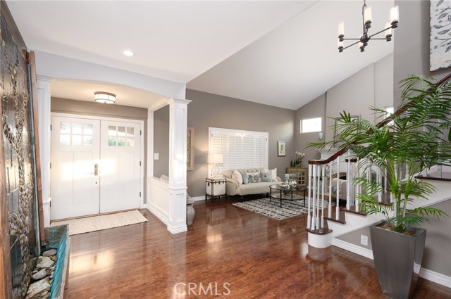 Open area with view of entry and living room
