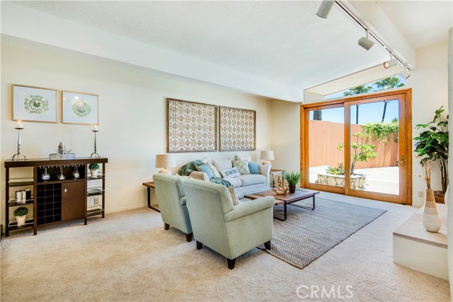 Family room off the kitchen with view, and fireplace.
