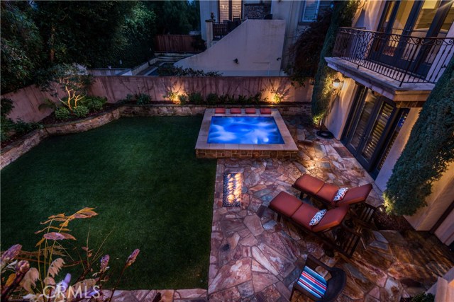 Backyard with spool & firepit