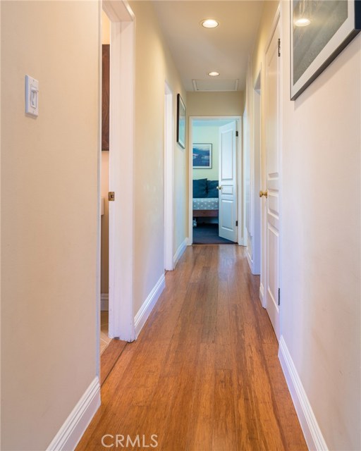 Bamboo floors leading to bedrooms and baths.