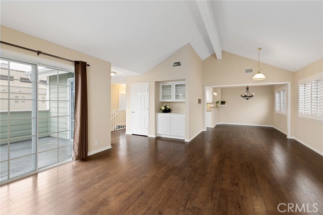Living Room, Patio, Dining area and hall way entrance.