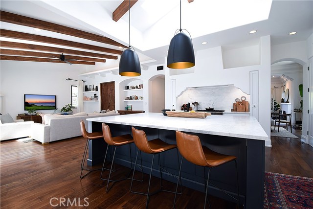 Kitchen with family room views and access.