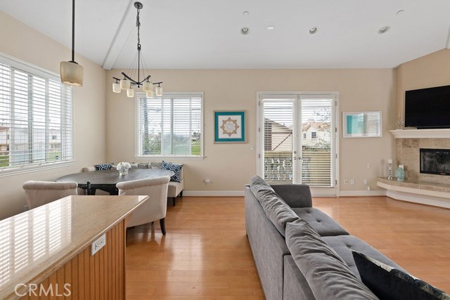 Large picture windows with expansive neighborhood views overlooking the walk path and bike trails