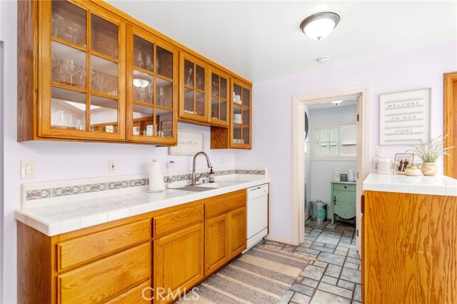 Kitchen is extremely functional & opens to separate laundry room with stackable laundry