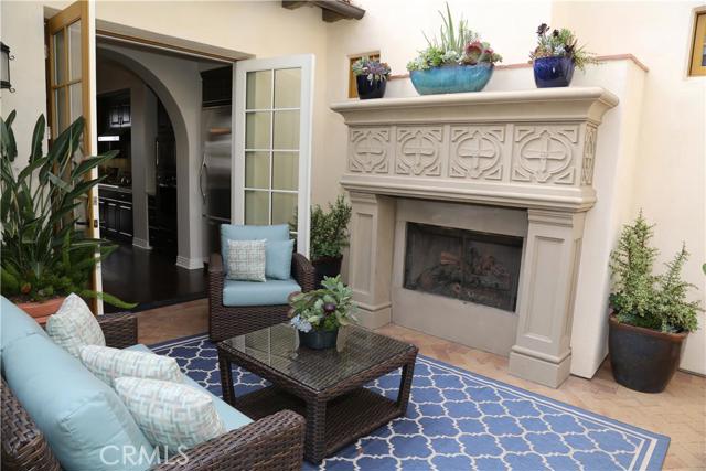 Relax in front of the fire while you appreciate the ocean views through the French doors of the kitchen.