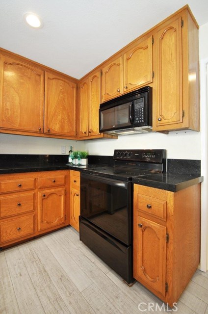 Loads of storage and cabinet space in both the kitchen and laundry room.