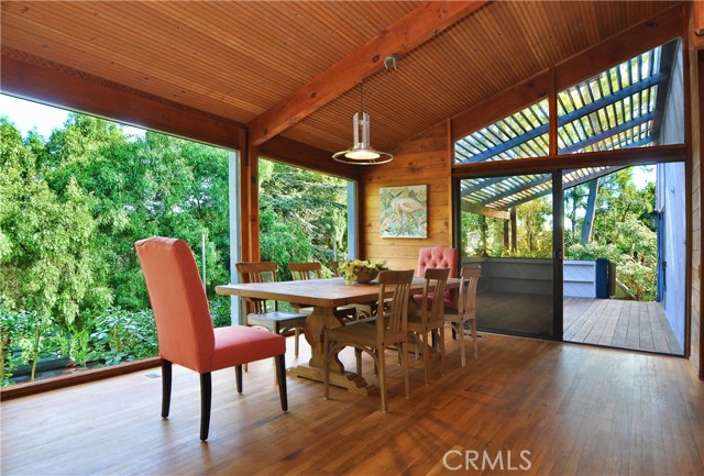 Dining area off of kitchen with Large deck outside