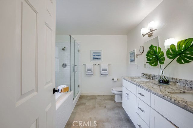 Completely remodeled bathroom with soaking tub and separate shower.