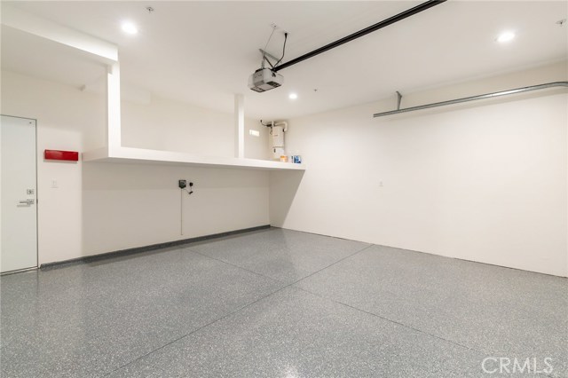 Durable, easy to clean garage floors, overhead storage shelf