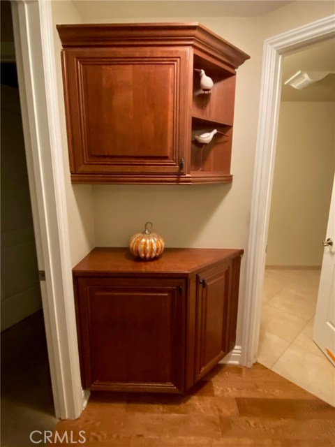 Wood Hallway Storage with display shelving.