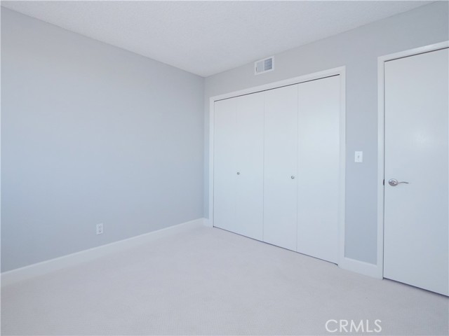 Double closet in upstairs bedroom 2 Double closet in upstairs bedroom 2