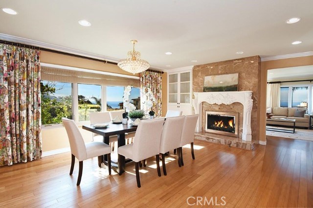 Dining Room with Fireplace & Chandelier