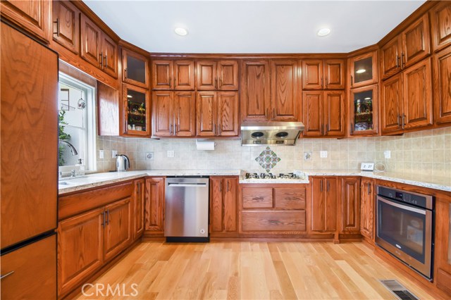 Kitchen with upgraded custom oak cabinets.