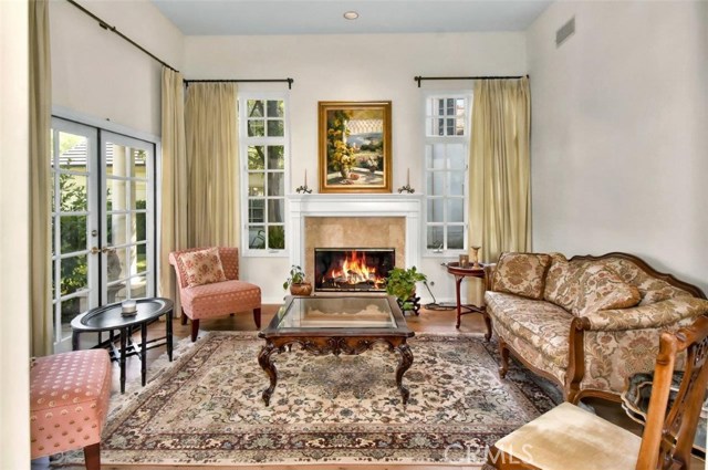 Living Room with Fireplace & High Ceiling