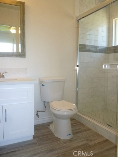 Bedroom 1 with walk-in shower.