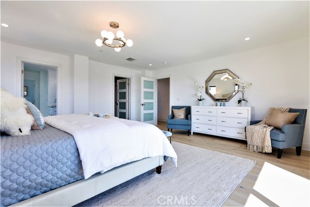 The Master Bedroom has a Private Bath and Walk-in Closet and Custom Lighting.