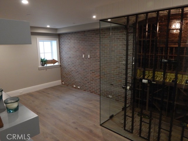 Basement with Glass Wine Cellar and Entertainment Room