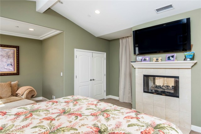 Master with fireplace and walk in closet.