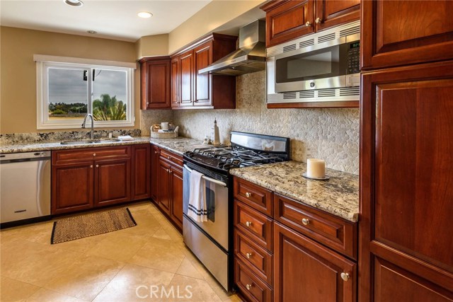 Designer Kitchen with Custom Cherry Cabinetry.