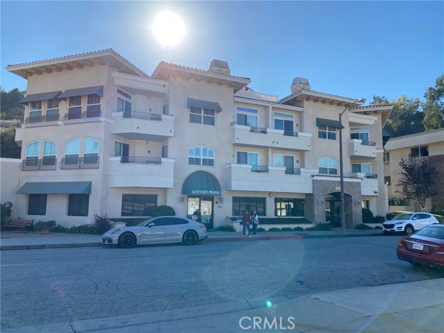 The Rolling Hills Villas Street View. There is a Pharmacy on the Ground Floor.