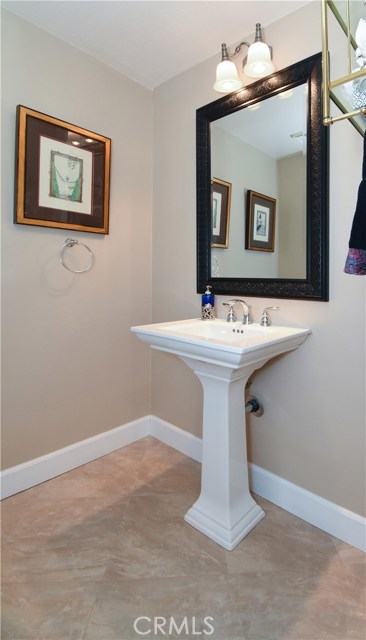 Upstairs powder room off entry hall