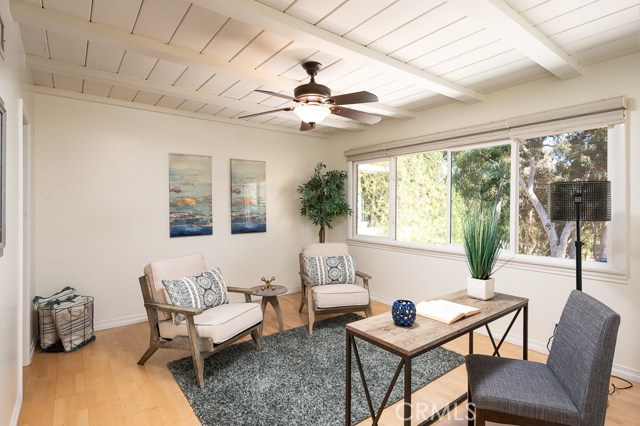 The front bedroom features golf course views and an undated ensuite bath - perfect for guests or a home office.