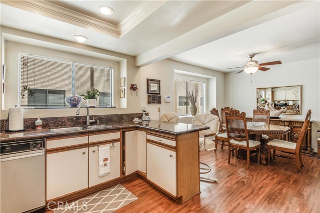 Open contact kitchen looking out to dining area.