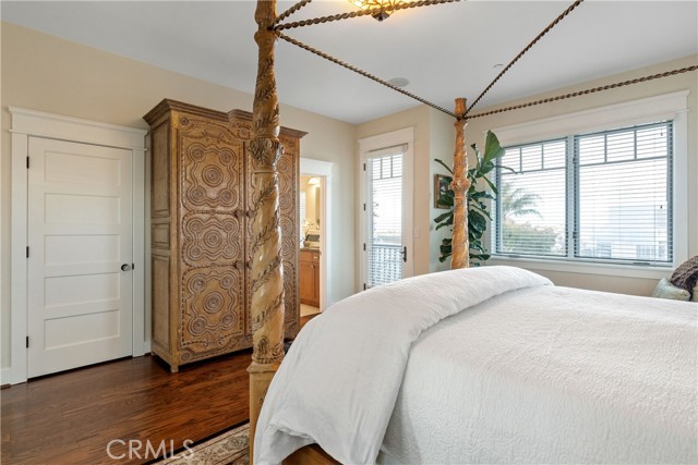 Primary Suite enjoys views from the bed...plus, there's a private balcony