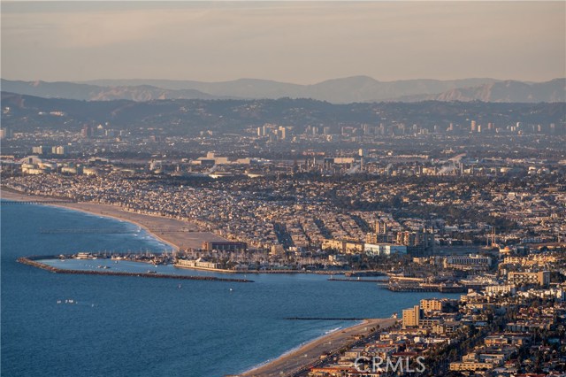 Close up view of the sand of Redondo Beach, King Harbor, and Hermosa Beach beyond.  Panoramic Ocean, City, and Mountain views GALORE.