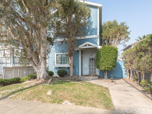 A view of the complex from the street. The condo complex contains a total of 9 units in 3 buildings. Unit 8 is located in the rear of this building that contains only two units!
