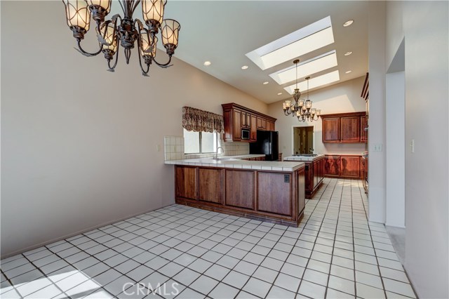 Informal dining room off kitchen with bar area