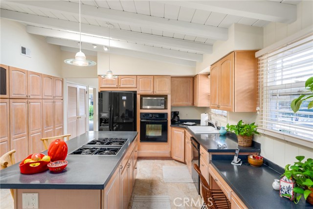 Love the pitched wood ceilings! Crack the windows open for the delightful ocean breezes