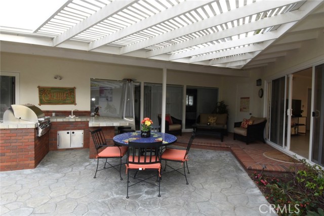 Nice patio off the kitchen/family room!  Builtt in BBQ/kitchen area!