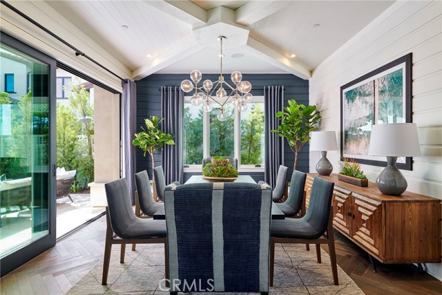 Formal dining room, opening onto private courtyard. Model home shown.