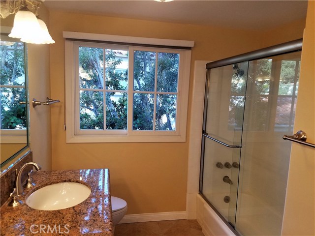 Upstairs bathroom with tub