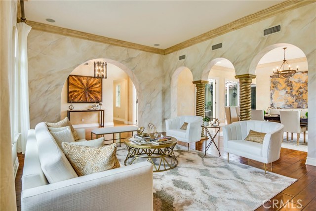 Shot from the formal living room near the fireplace. Looking back towards entrance.