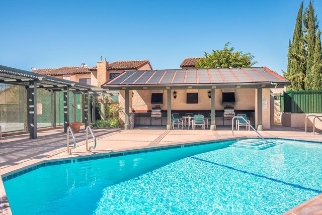 pool area with basketball court on left & jacuzzi on right. covered bbq area pool area with basketball court on left & jacuzzi on right. covered bbq area