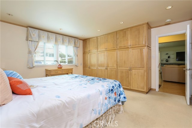 Large master bedroom with built in closets, drawers