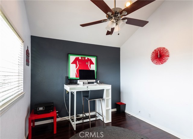 Bedroom filled with natural light and soaring ceilings and abundant storage