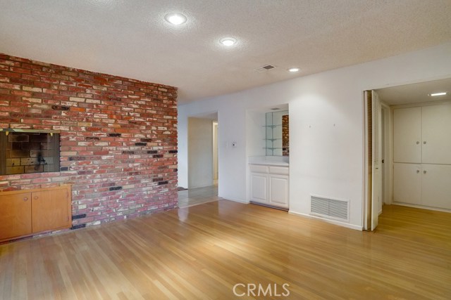  Family/Dining Room with Double sided brick fireplace